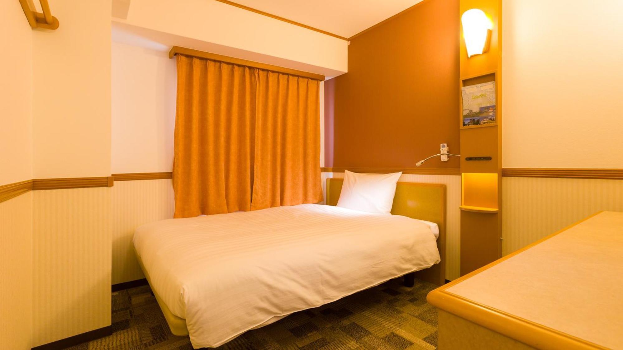 Toyoko Inn Yokohama Tsurumi Eki Higashi Guchi Rom bilde
